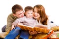 Parents reading to their kid Royalty Free Stock Photo