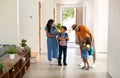 Parents Saying Goodbye To Children As They Leave Home For School Royalty Free Stock Photo