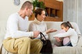 Parents scolding daughter at home Royalty Free Stock Photo