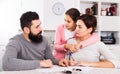 Parents signing papers for divorce Royalty Free Stock Photo