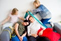 Parents sleeping in a middle of a mess Royalty Free Stock Photo