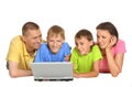 Parents with sons using laptop Royalty Free Stock Photo