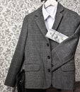 Parents spend the school student`s suit, how many money for clothes in school, a school uniform, school, all for school Royalty Free Stock Photo