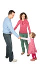 Parents stand having joined hands with daughter