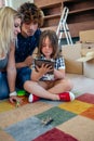 Parents supervising their little son playing tablet Royalty Free Stock Photo