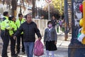 parents take their children to the entrance of the school