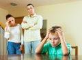 Parents and teen son after quarrel at home Royalty Free Stock Photo