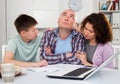 Chagrined family analyzing finances Royalty Free Stock Photo