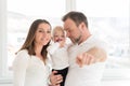 Parents with their beautiful baby girl at home. Family values. Royalty Free Stock Photo