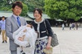 Parents and their newborn at the Meiji Shrine in Tokyo