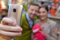 parents-to-be shopping choosing plush for their kid Royalty Free Stock Photo