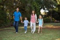 Parents walking with their two children Royalty Free Stock Photo