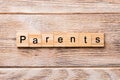 Parents word written on wood block. Parents text on wooden table for your desing, concept Royalty Free Stock Photo