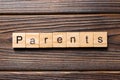 Parents word written on wood block. Parents text on wooden table for your desing, concept Royalty Free Stock Photo