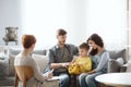 Parents work with child in therapy sessions so they learn tips and ideas for keeping up the lessons at home Royalty Free Stock Photo