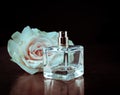 Parfume bottles with rose Royalty Free Stock Photo