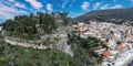 Parga city, Greece aerial drone view view of Venetian Castle ruins, coastal traditional building Royalty Free Stock Photo