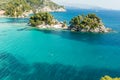 Parga sea island blue among green pine trees greece Royalty Free Stock Photo