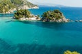 Parga sea island blue among green pine trees greece Royalty Free Stock Photo