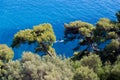 Parga sea island blue among green pine trees greece Royalty Free Stock Photo