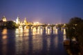 Pargue charles bridge by night reflections river moving lights Royalty Free Stock Photo
