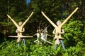 Sculptures of gymnasts by the Finnish sculptor Veio Ryonkkonen in his estate `The Mystical Forest`