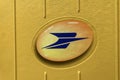 PARIS - APRIL 11, 2021: Yellow embleme of La Poste postbox in Paris, France