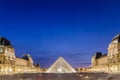 PARIS - AUGUST 18: Louvre museum at sunset on