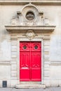 Paris, beautiful red wooden door Royalty Free Stock Photo