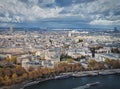 Paris city aerial sightseeing view over the Seine river. Beautiful seasonal panorama with colorful autumn trees Royalty Free Stock Photo