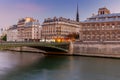 Paris. City embankment at sunset. Royalty Free Stock Photo