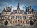 Paris City Hall, France. Outdoors view to the beautiful ornate facade of the historical building and the olympic games rings