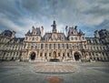 Paris City Hall, France. Outdoors view to the beautiful ornate facade of the historical building and the olympic games rings