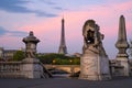 Paris cityscape with Eiffel Tower and Lions on Alexandre Bridge