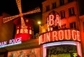 PARIS - DECEMBER 2012: Exterior view of Moulin Rouge. This is a famous tourist attraction