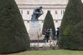 Paris, 30 december 2017: tourists take photographs of statue thinker by Rodin Royalty Free Stock Photo