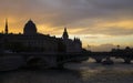 Paris at dusk time, Conciergerie and Pont au Change Royalty Free Stock Photo