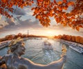 Paris with Eiffel Tower against autumn leaves in France