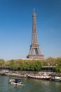 Paris with Eiffel Tower against boats during spring time in France Royalty Free Stock Photo