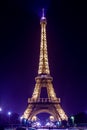 Paris Eiffel Tower by night. Purple light