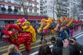 Chinese New Year, parade of dragon dance celebration the Dragon year in the thirteen district of Paris under a rain