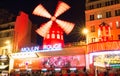 The Moulin Rouge , Paris, France. It is a famous cabaret built in 1889, locating in the Paris red-light district of Royalty Free Stock Photo