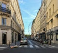 Paris ferris wheel as glimpsed down Paris street