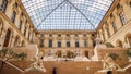 Ancient sculptures in the inner hall of Louvre museum Paris France. April 2019