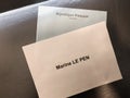 PARIS, FRANCE - APRIL 10, 2022: Ballots with the names of candidates for the presidential elections in France.Translation Republic