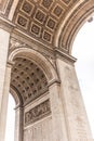 Paris, France - APRIL 9, 2019: Detais of the Arc de Triomphe on a cloudy day, Paris Royalty Free Stock Photo