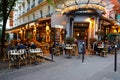 The French traditional cafe Au cepage Montmartrois located in Montmartre area at evening . Royalty Free Stock Photo