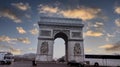 PARIS, FRANCE - APRIL-19-2020 :The front view of Triumphal Arch de l Etoile. The monument was designed by Jean Chalgrin in 1806 in Royalty Free Stock Photo