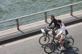 Paris, France - April 17, 2011: A group of people riding bicycles along the river embankment Royalty Free Stock Photo