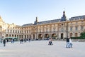 PARIS, FRANCE - april 22, 2016: The Louvre palace in the Carrousel Square. Louvre Museum at the sunset